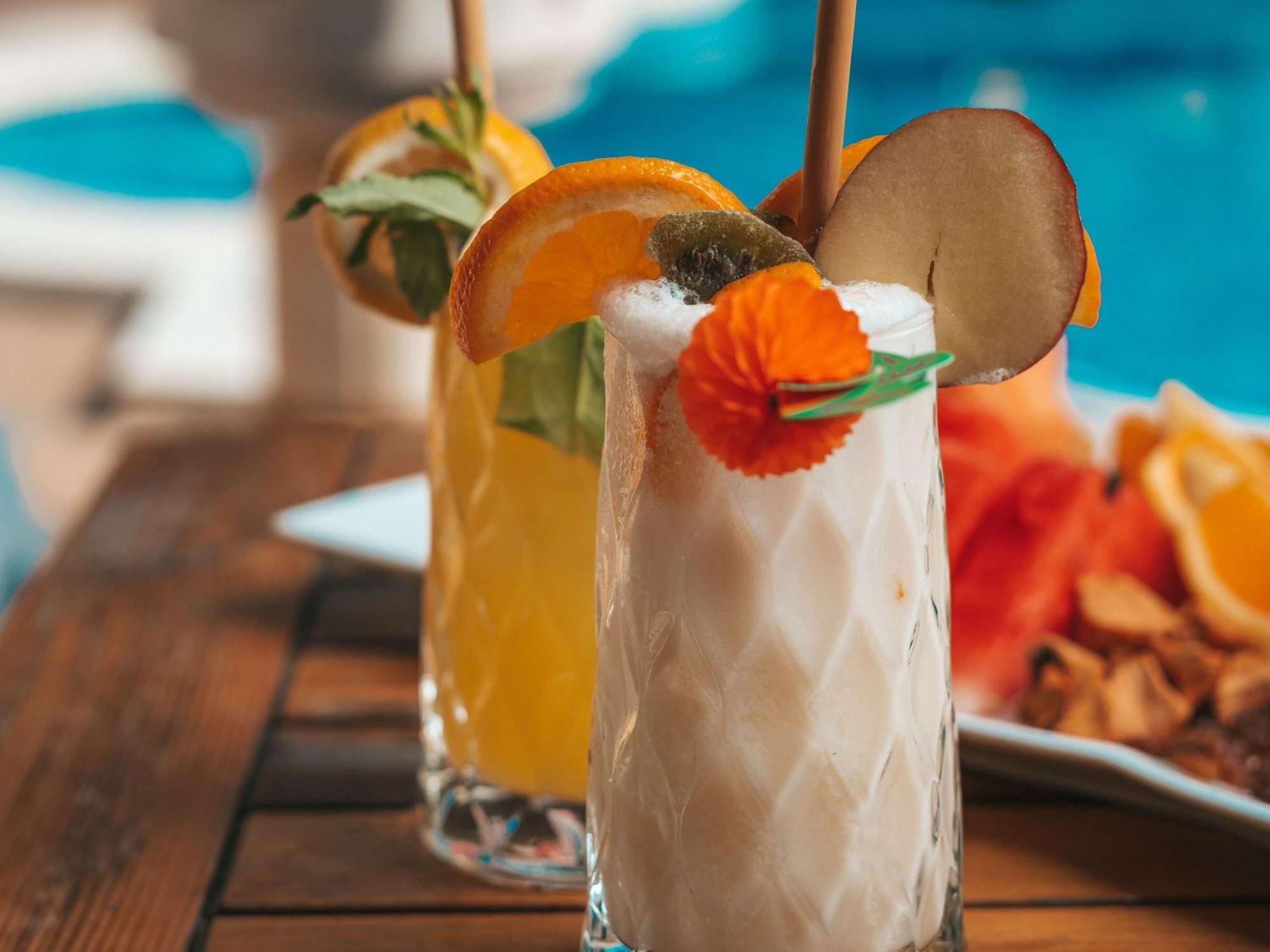 Moevenpick Hotel & Apartments Ghala Muscat Exterior photo A coconut margarita