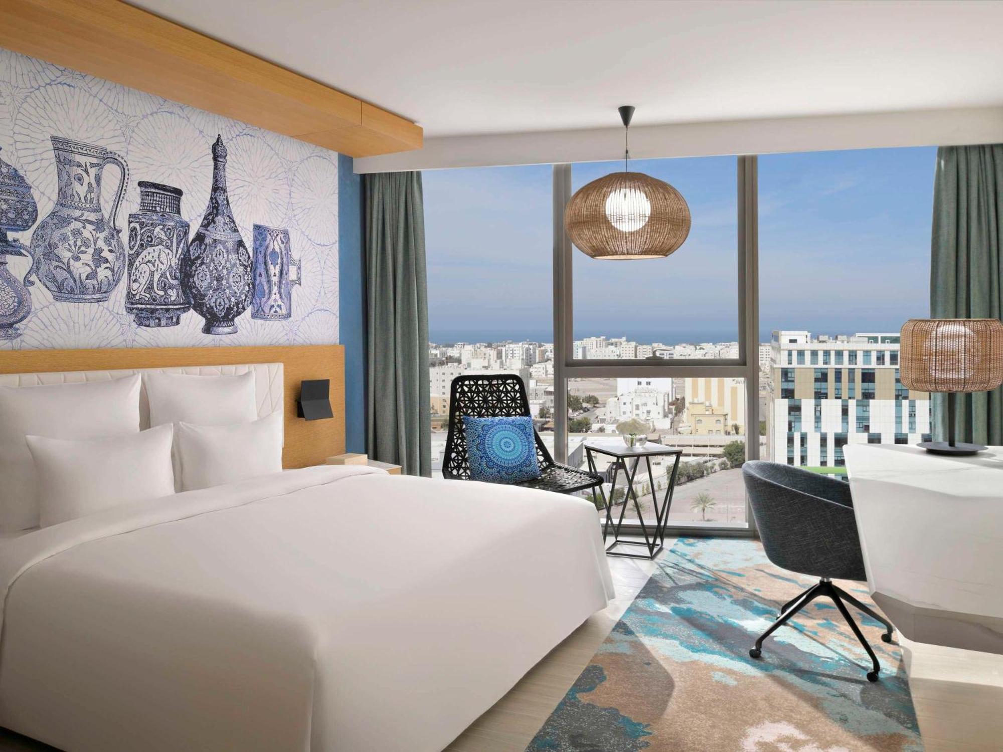 Moevenpick Hotel & Apartments Ghala Muscat Exterior photo Deluxe Room