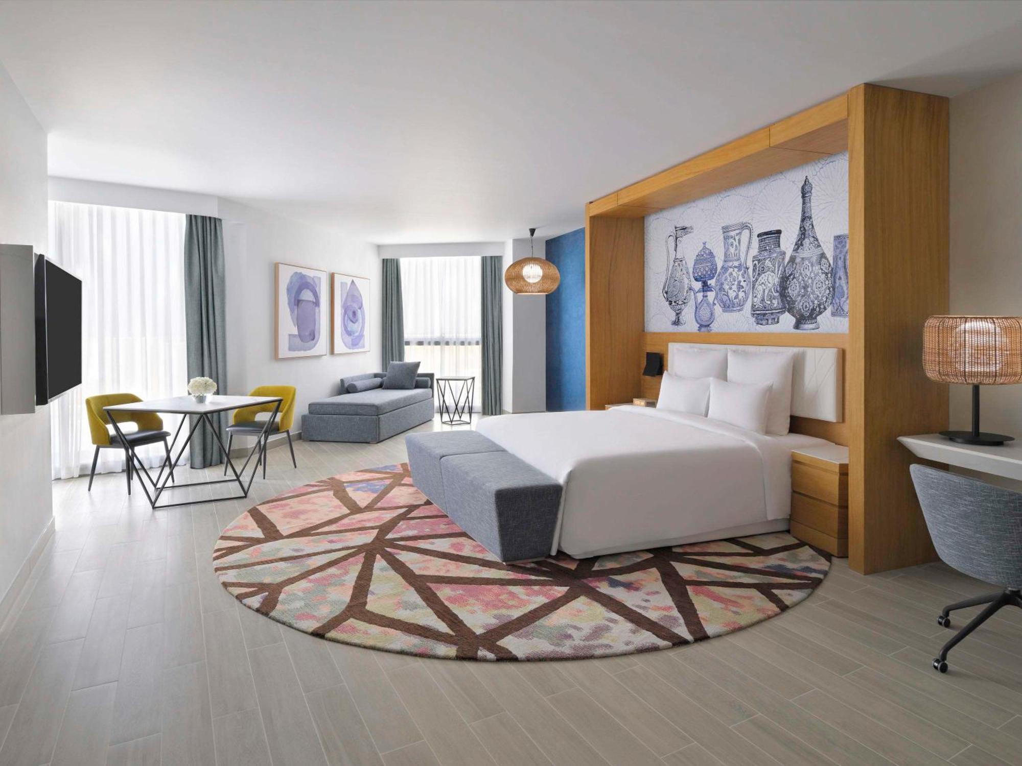 Moevenpick Hotel & Apartments Ghala Muscat Exterior photo A room at the hotel
